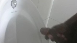 Horny jamaican cum in public toilet at work