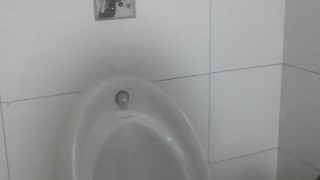Horny jamaican cum in public toilet at work