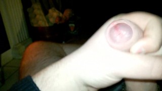 A wank by the fireplace.