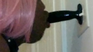 Kyla Throatz sucking dildo