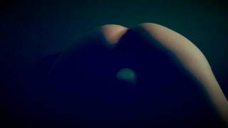 Dark room, kitten plays.