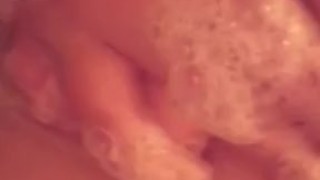 Chubby Babe Soaps Up Tits In Shower