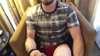 Pulling out bulging cock from jeans and stroking