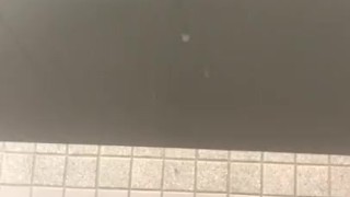 Masturbating
