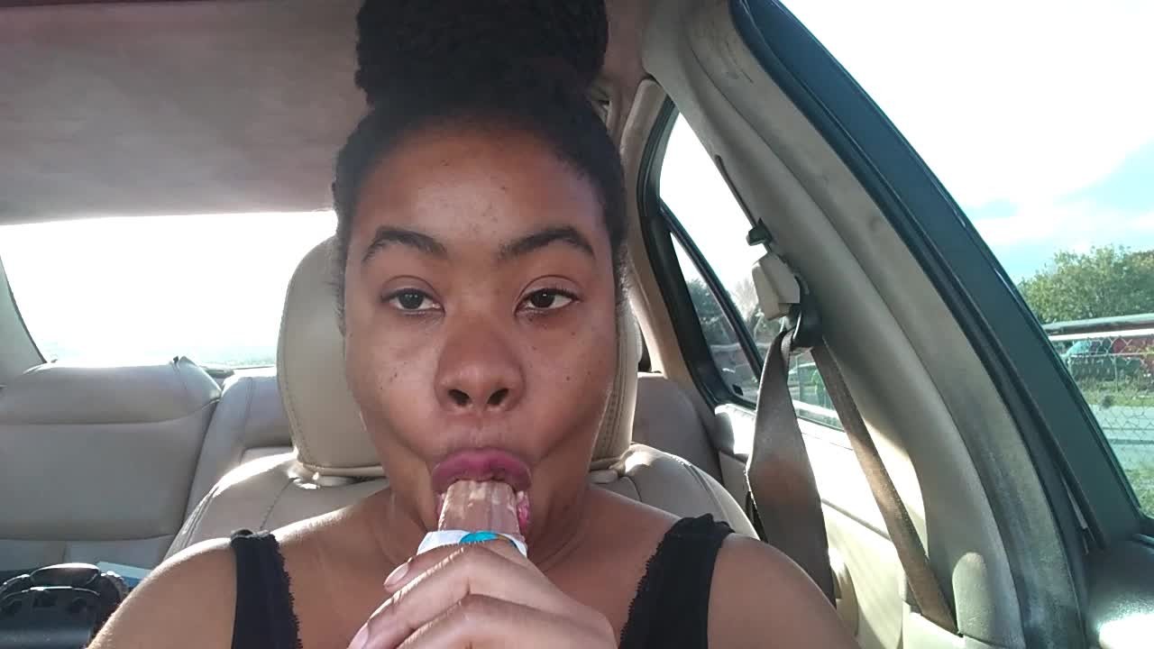 Ebony Big Lips Sucking Ice cream Pop Outside in Car - Cami Creams