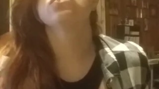 Sexy redhead smoking with tits out fetish play