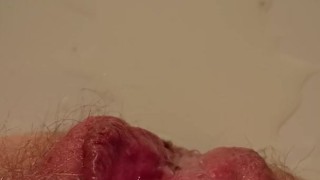 Moaning from pleasuring hairy pissing pussy