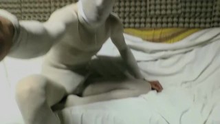 YOUNG GUY IN WHITE PANTYHOSE ENCASEMENT MASTURBATING