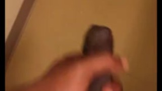 Stroking uncut cock
