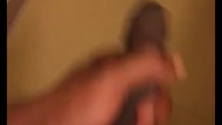 Stroking uncut cock