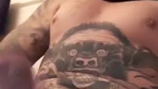 Tattooed Bearded homeless man jerks it