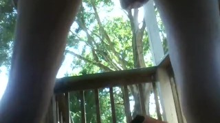 MILF on front porch masturebating