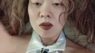 Asian schoolgirl mouth fucking her toy