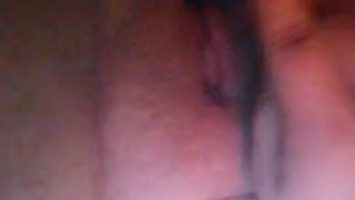 Masturbating