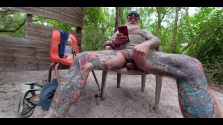 Inked Daddy Bear Stroking and Pissing in the Woods