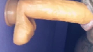 Black girl deep throats dildo