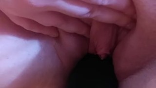 Naughty Nicole toys her pussy with a cucumber on dining room table