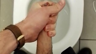 Horny teen wanking and cumming at school toilet