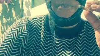 Masked ebony bbw smoking outside in back garden sucking vibrator in secret