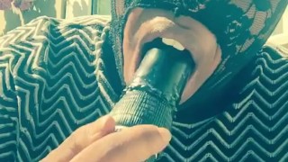 Masked ebony bbw smoking outside in back garden sucking vibrator in secret