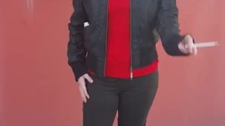 Non-nude public outdoor smoking video. Goddess wears high heeled boots.