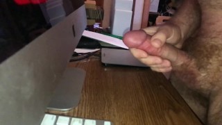 slow motion cumshot on desk