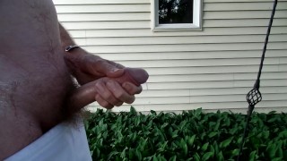 Jerking my dick in the backyard......