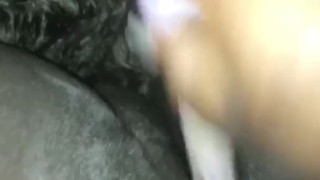 Masturbating