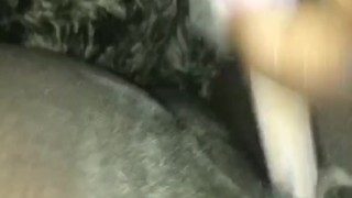 Masturbating