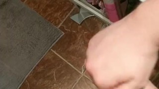 Jerking uncut cock with saliva