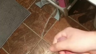 Jerking uncut cock with saliva