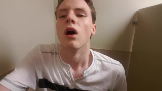 Young guy jerks his hung cock before heading to work