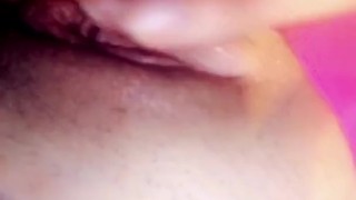 Brunette girl plays with juicy pussy