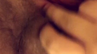 Pregnant MILF plays with hairy pussy in shower