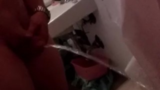 Pissing in my friends shower