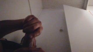 Stroking my big cock in public at the porn store