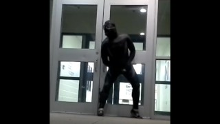 lubed rubber man cums in front of doors