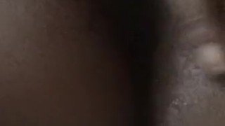 Ebony BBW removing large butt plug from arse. Damn.