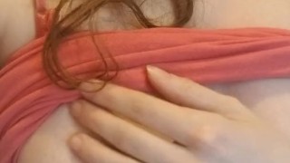 Slut plays with her small tits