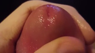 Teasing big uncut dick glans with precum play