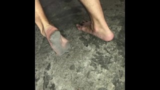 very dirty sexy feet soles walking on the parking