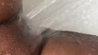 Slutty mom gets fucked by shower head