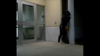 barefoot frogman cums inside a condom in front of hotel doors
