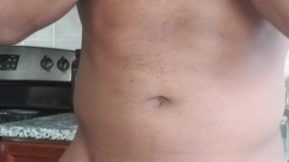 Muscle hunk swings big black dick