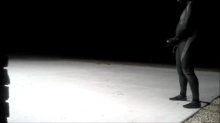 frogman jerks off outside of industrial area