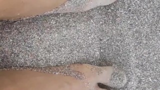 Rubbing feet in the sand