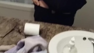 guy masterbates in bathroom