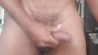 Muscle ebony strokes black dick after a workout