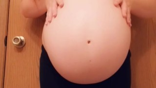 Tiny mama gives a sneak peak of her unborn while baby daddy showers