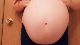 Tiny mama gives a sneak peak of her unborn while baby daddy showers